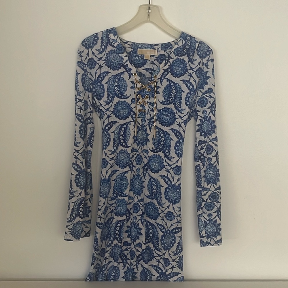 Very summery great looking dress in dark light blue colour with gold stripes.